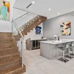 Bar and wood stairway by Blue Daze Designs, orlando interior design