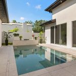 Courtyard with pool by Blue Daze Designs, orlando interior design